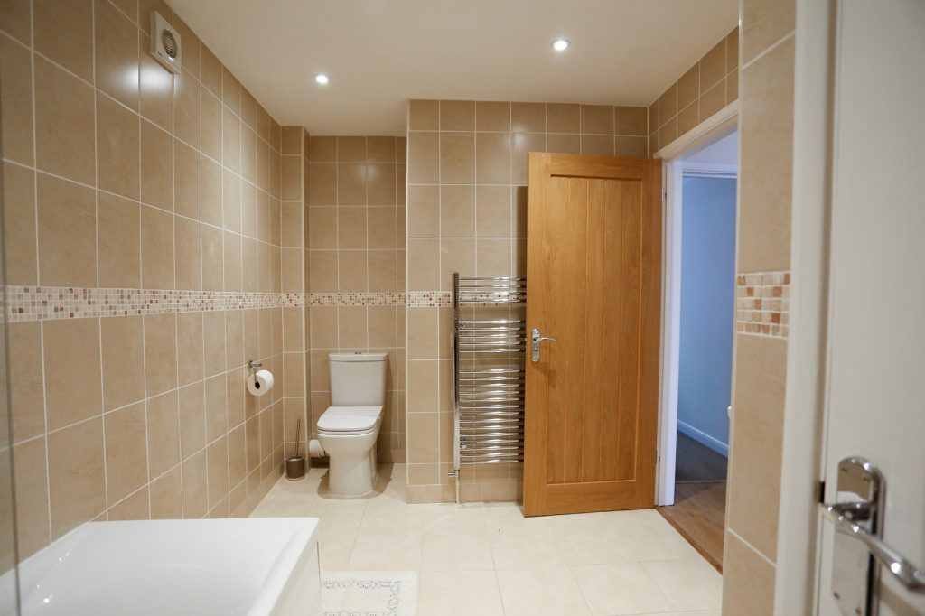 Bathroom with toilet and heated towel rail