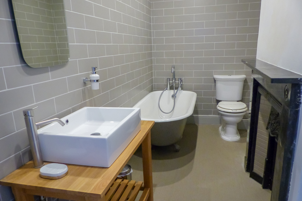 Family bathroom, square wash basin with singular mixer tap, bath and W/C